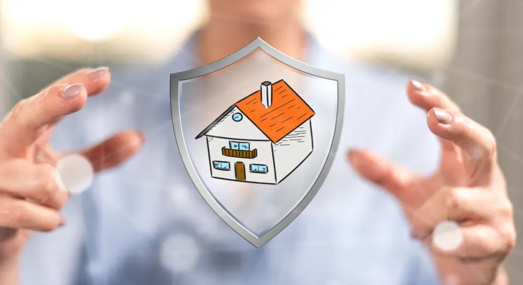 Woman holding a house being shielded, depicting how homes can help protect from inflation